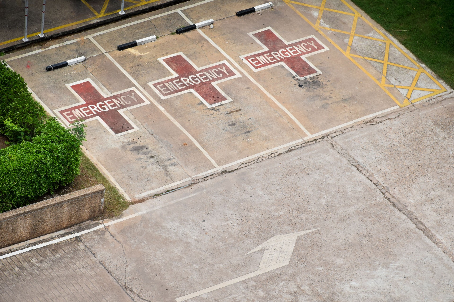 Emergency parking lanes and traffic lines for ambulances or emergency vehicles at hospital parking lots.